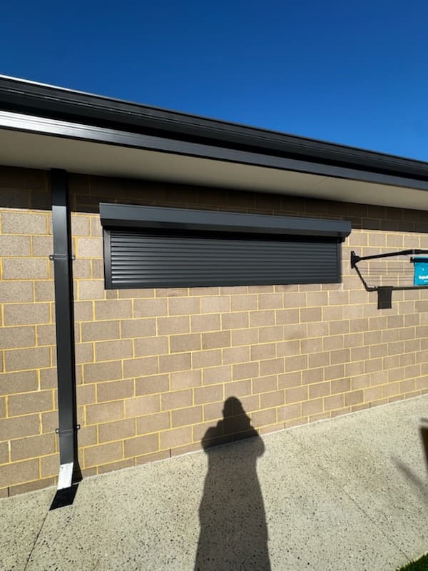 Roller shutter installed on brick commercial building