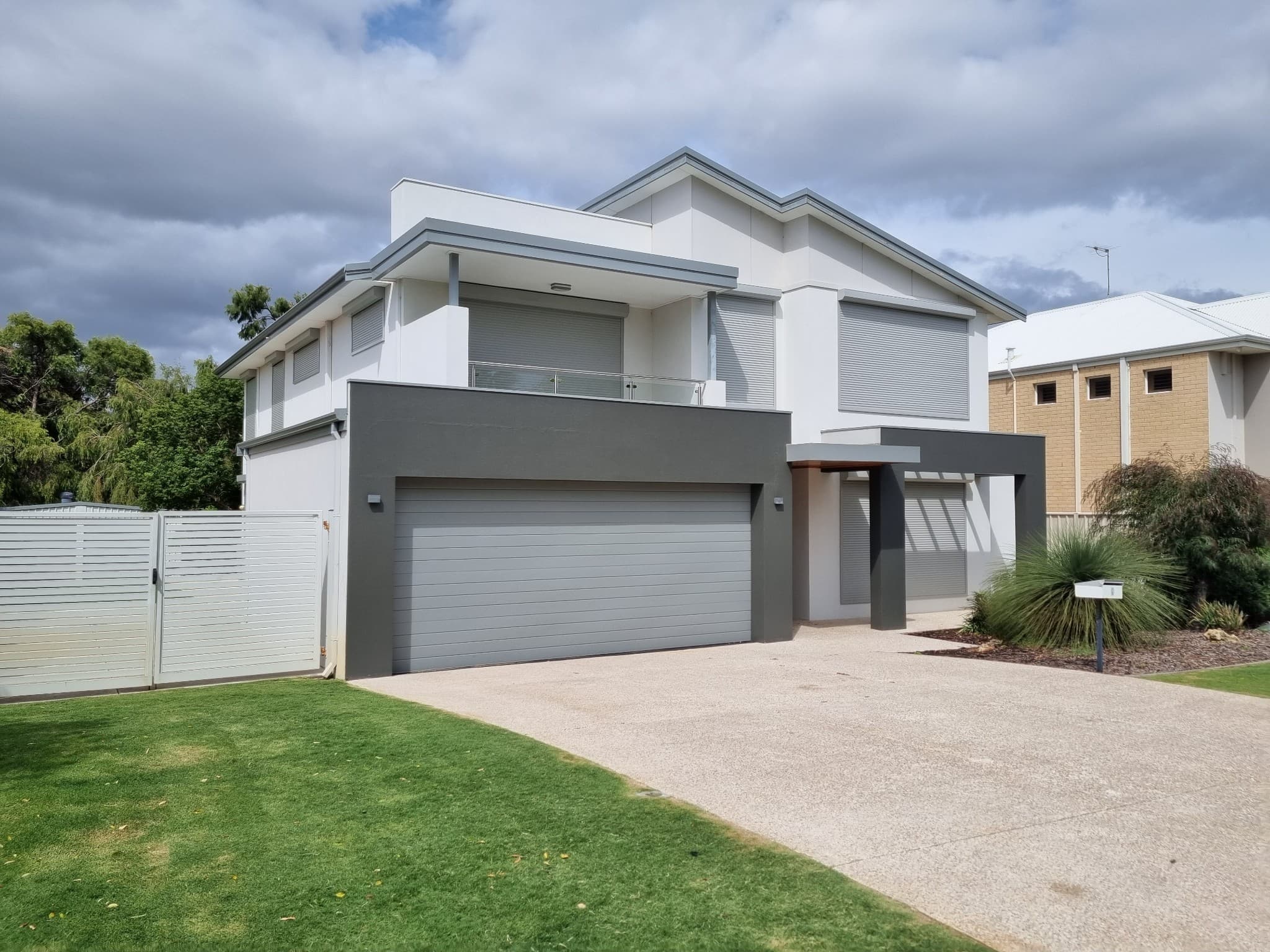 Modern Perth home with roller shutters installed
